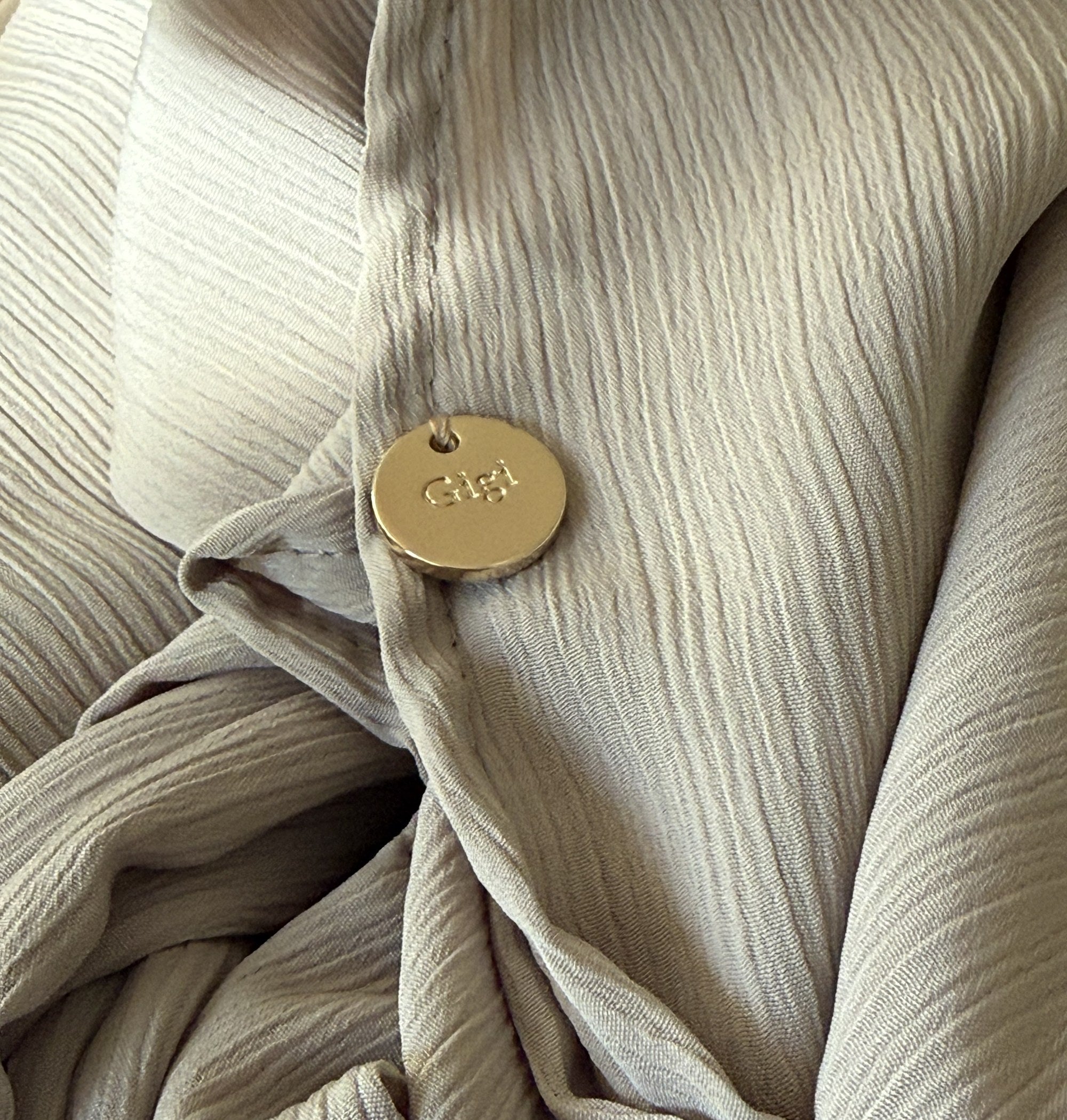 Tissu GIGI avec la médaille dorée GIGI